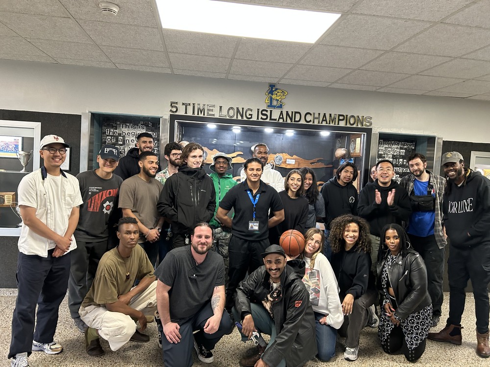 Students with the crew and actors from the commercial