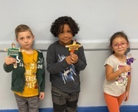 Students pose with their worry dolls